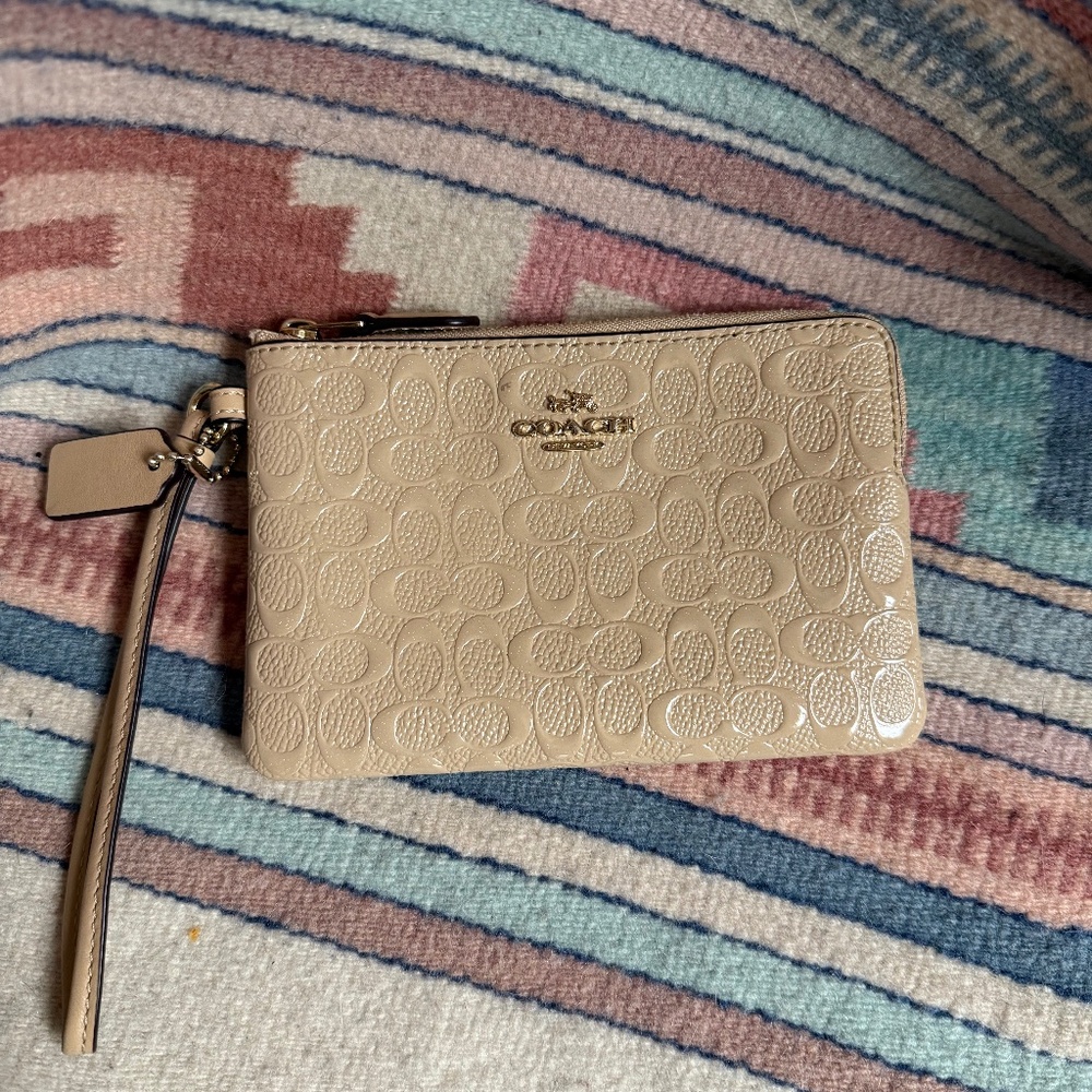 Coach Patent Leather Embossed Logo Wristlet – Beige